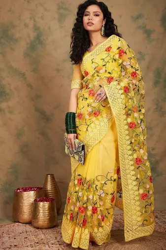 Yellow embroidered net sarees