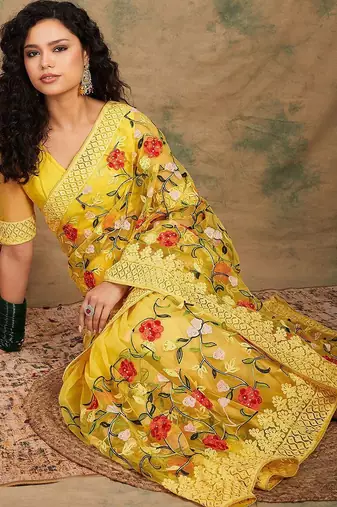 Yellow embroidered net sarees