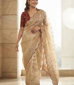 Cream embellished sequinned tissue heavy work saree