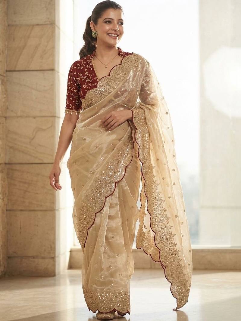 Cream embellished sequinned tissue heavy work saree