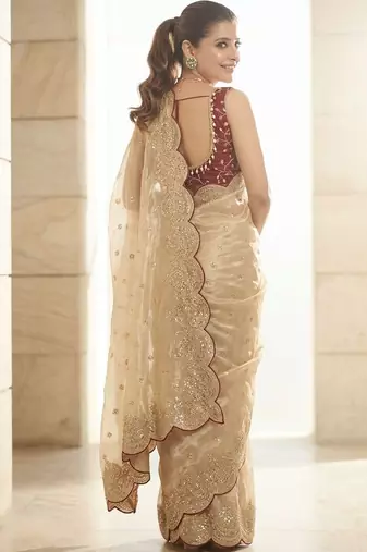 Cream embellished sequinned tissue heavy work saree