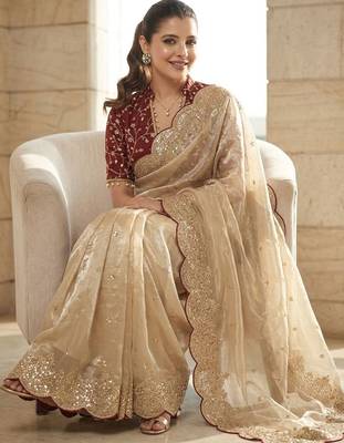 Cream embellished sequinned tissue heavy work saree 4