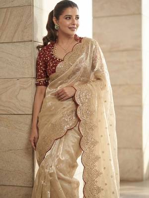 Cream embellished sequinned tissue heavy work saree 5