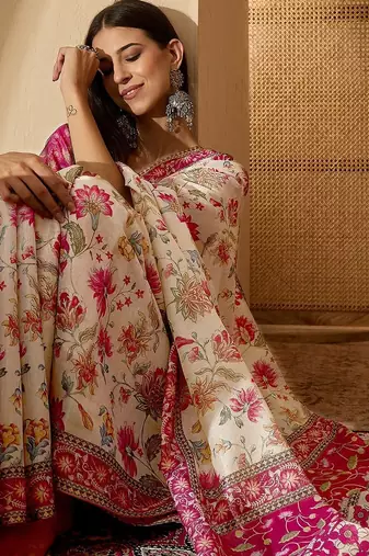 Beige floral printed  linen saree with tassels & unstithced blouse piece