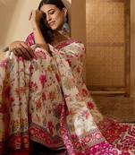Beige floral printed  linen saree with tassels & unstithced blouse piece