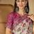 Beige floral printed  linen saree with tassels & unstithced blouse piece