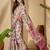 Beige floral printed  linen saree with tassels & unstithced blouse piece