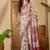 Beige floral printed  linen saree with tassels & unstithced blouse piece
