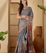 Grey  linen printed sarees with tassels & unstithced blouse piece