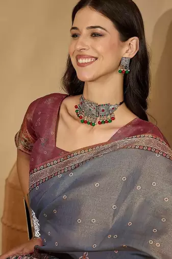Grey  linen printed sarees with tassels & unstithced blouse piece