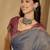Grey  linen printed sarees with tassels & unstithced blouse piece