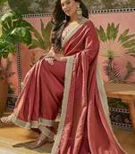 Maroon textured tissue silk saree with embellished border and designer blouse