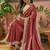 Maroon textured tissue silk saree with embellished border and designer blouse
