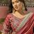 Maroon textured tissue silk saree with embellished border and designer blouse
