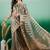 Green zari woven striped kanjeevaram saree with blouse piece
