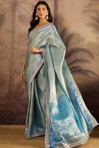 Blue woven design saree with unstitched blouse