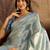 Blue woven design saree with unstitched blouse