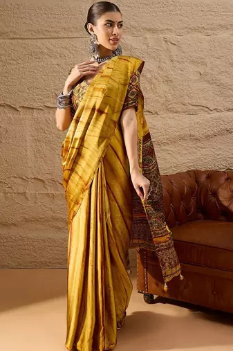 Mustard women mustard printed crepe saree