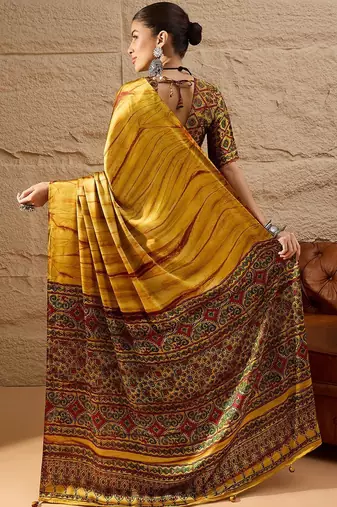 Mustard women mustard printed crepe saree