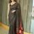 Black ethnic motifs mirror work heavy work saree