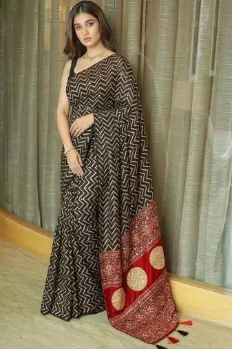 Black ethnic motifs mirror work heavy work saree