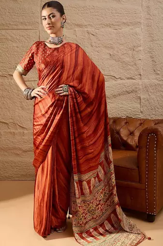 Rust rust crepe ethnic printed party wear saree with matching blouse
