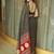 Black ethnic motifs mirror work heavy work saree