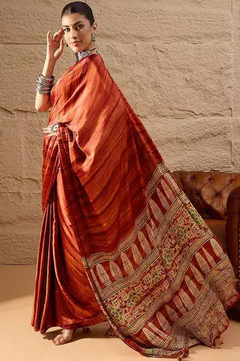 Rust rust crepe ethnic printed party wear saree with matching blouse