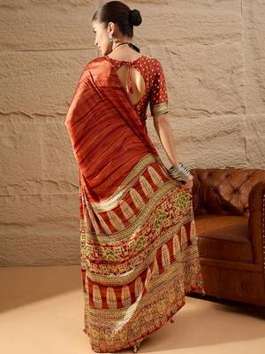 Rust rust crepe ethnic printed party wear saree with matching blouse 4