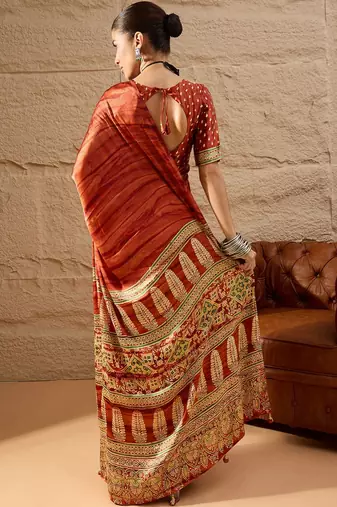 Rust rust crepe ethnic printed party wear saree with matching blouse