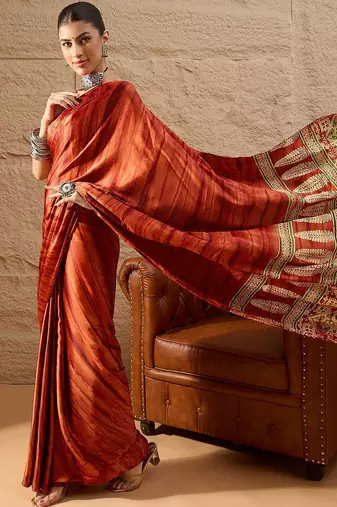 Rust rust crepe ethnic printed party wear saree with matching blouse