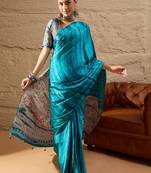 Blue women light blue crepe printed party wear saree with matching blouse