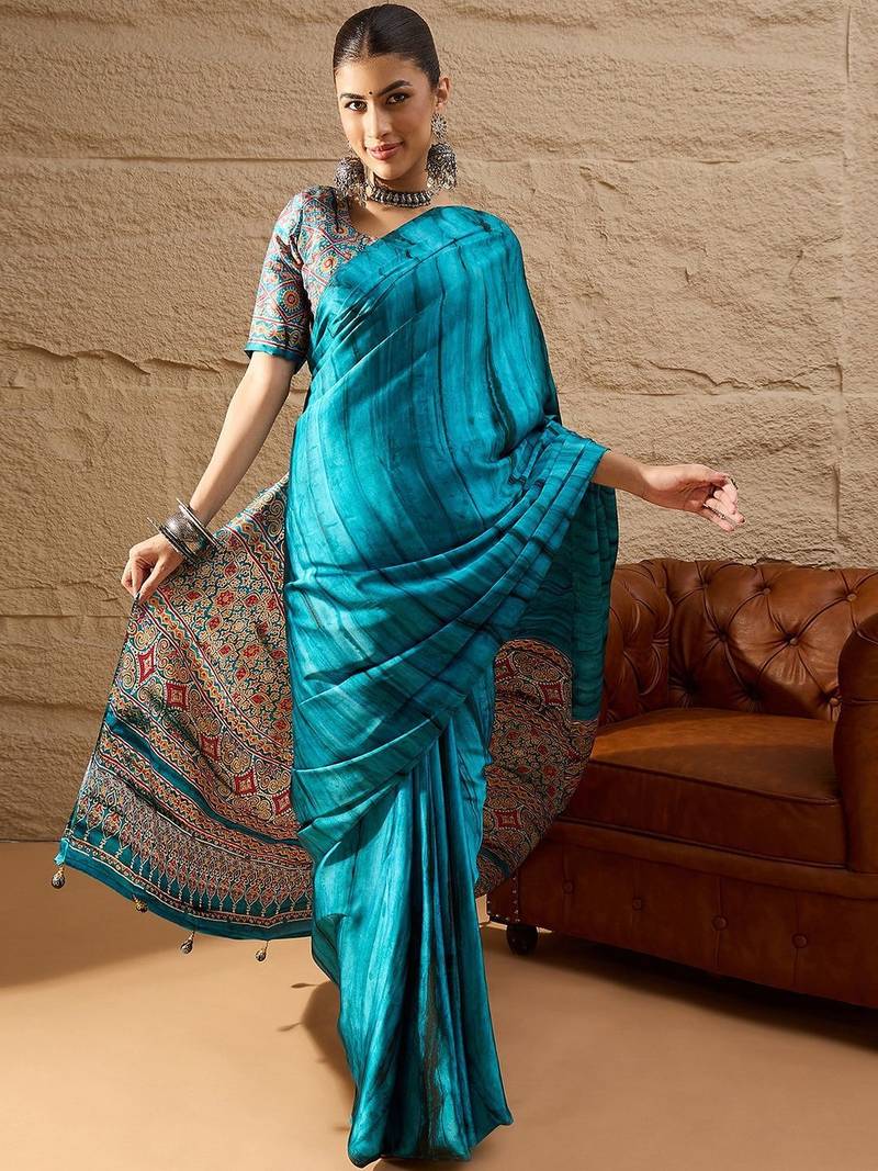 Blue women light blue crepe printed party wear saree with matching blouse
