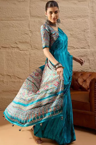 Blue women light blue crepe printed party wear saree with matching blouse