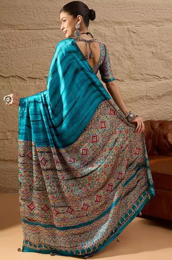 Blue women light blue crepe printed party wear saree with matching blouse