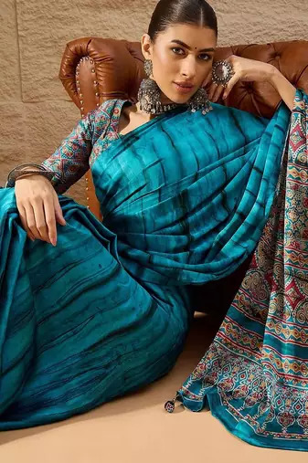 Blue women light blue crepe printed party wear saree with matching blouse