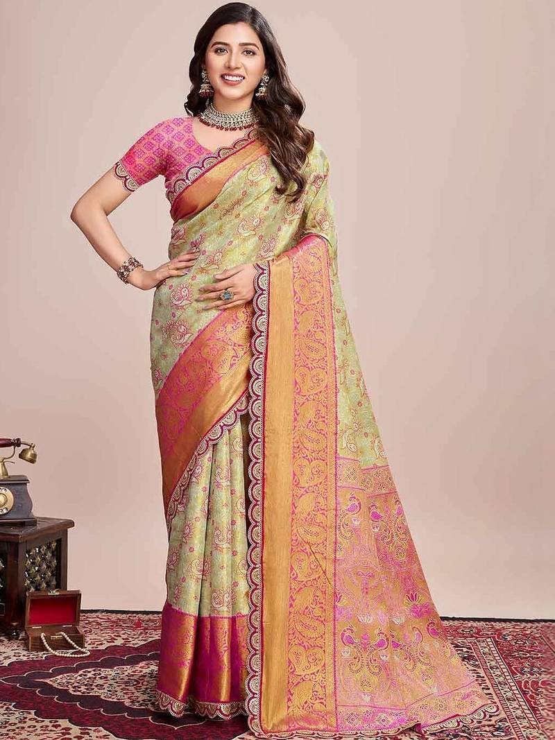 Sea green woven design saree with unstitched blouse piece