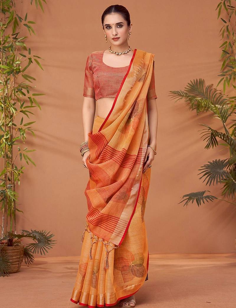 Orange printed saree with matching blouse