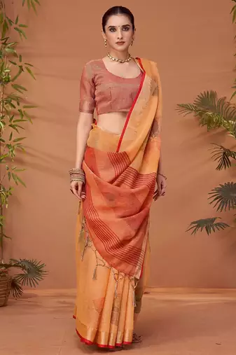 Orange printed saree with matching blouse