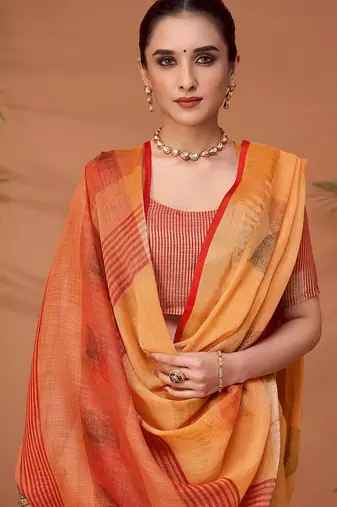 Orange printed saree with matching blouse