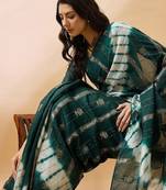 Green green ethnic motifs woven designed sequinned sarees