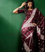 Burgundy burgundy ethnic motifs woven designed zari sarees