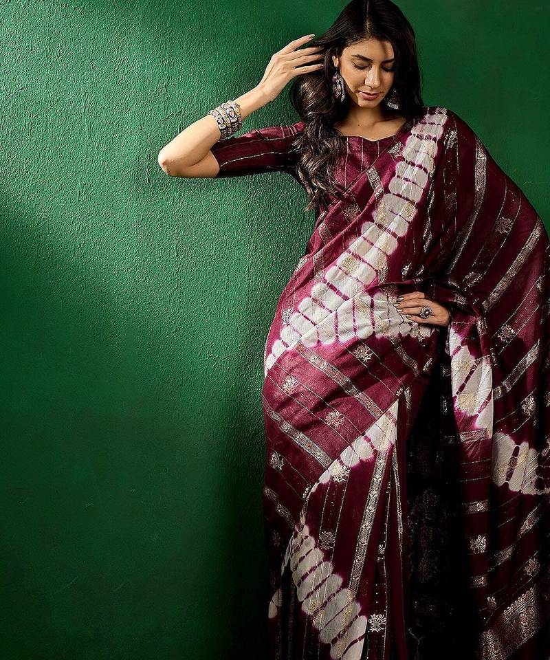 Burgundy burgundy ethnic motifs woven designed zari sarees