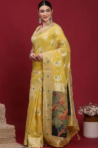 Yellow woven design zari banarasi fastive saree with matching blouse