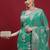 Teal woven design zari banarasi fastive saree with matching blouse