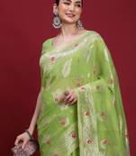 Green woven design zari banarasi fastive saree with matching blouse