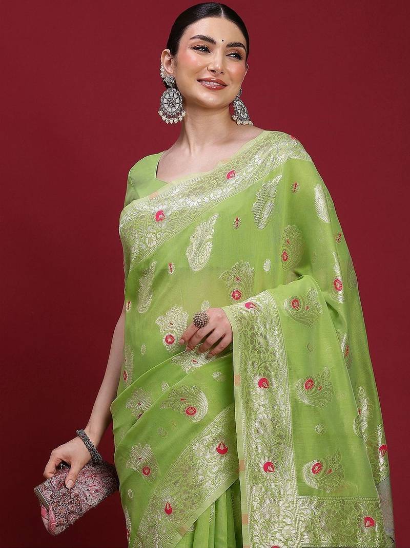 Green woven design zari banarasi fastive saree with matching blouse