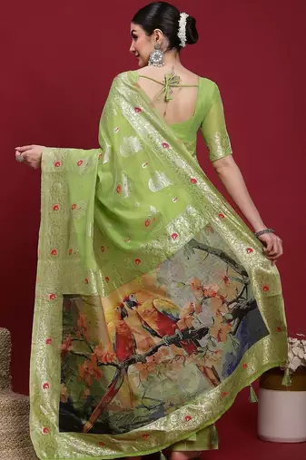 Green woven design zari banarasi fastive saree with matching blouse