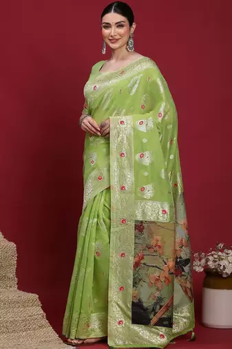 Green woven design zari banarasi fastive saree with matching blouse