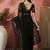 Black embroidered net saree with unstitched blouse